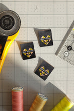 Load image into Gallery viewer, The Weekend Quilter Made with Love woven labels for handmade and clothing items in ivory and midnight black