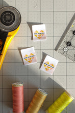 Load image into Gallery viewer, The Weekend Quilter Made with Love woven labels for handmade and clothing items in ivory and midnight black