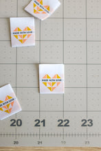 Load image into Gallery viewer, The Weekend Quilter Made with Love woven labels for handmade and clothing items in ivory and midnight black