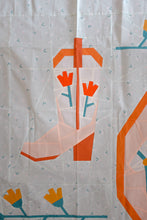 Load image into Gallery viewer, Blushing Boot foundation paper pieced quilt block by The Weekend Quilter, featuring a modern pink and orange cowboy boot with tulip flowers on a soft cream background. Western-themed mini quilt pattern for modern quilters, perfect for wall hangings or incorporating into larger quilt projects. Beginner-friendly FPP design with step-by-step instructions.