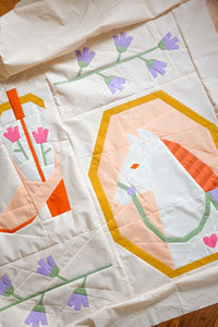 Petals & Stable Mini Quilt Pattern Bundle by The Weekend Quilter featuring three modern foundation paper pieced mini quilt designs: Desert Mare horse quilt block, Blushing Boot cowboy boot quilt block with tulips, and Wildflower Vine floral quilt block. Includes baby and throw size quilt layout instructions. Western and floral-themed quilting pattern bundle for modern quilters.