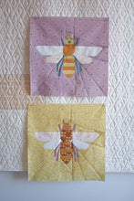 Load image into Gallery viewer, Two quilted blocks with bee designs on a textured white background. Pollen Gatherer foundation paper pieced (FPP) quilt block designed by The Weekend Quilter.  fabrics all from the GeoBloom Fabric collection for AGF 
