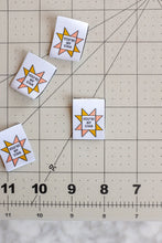Load image into Gallery viewer, The Weekend Quilter You’re a Star sawtooth star woven labels for handmade and clothing items in ivory and marigold yellow