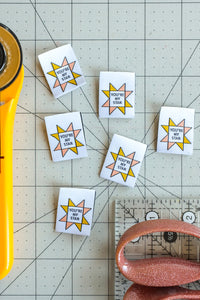 The Weekend Quilter You’re a Star sawtooth star woven labels for handmade and clothing items in ivory and marigold yellow